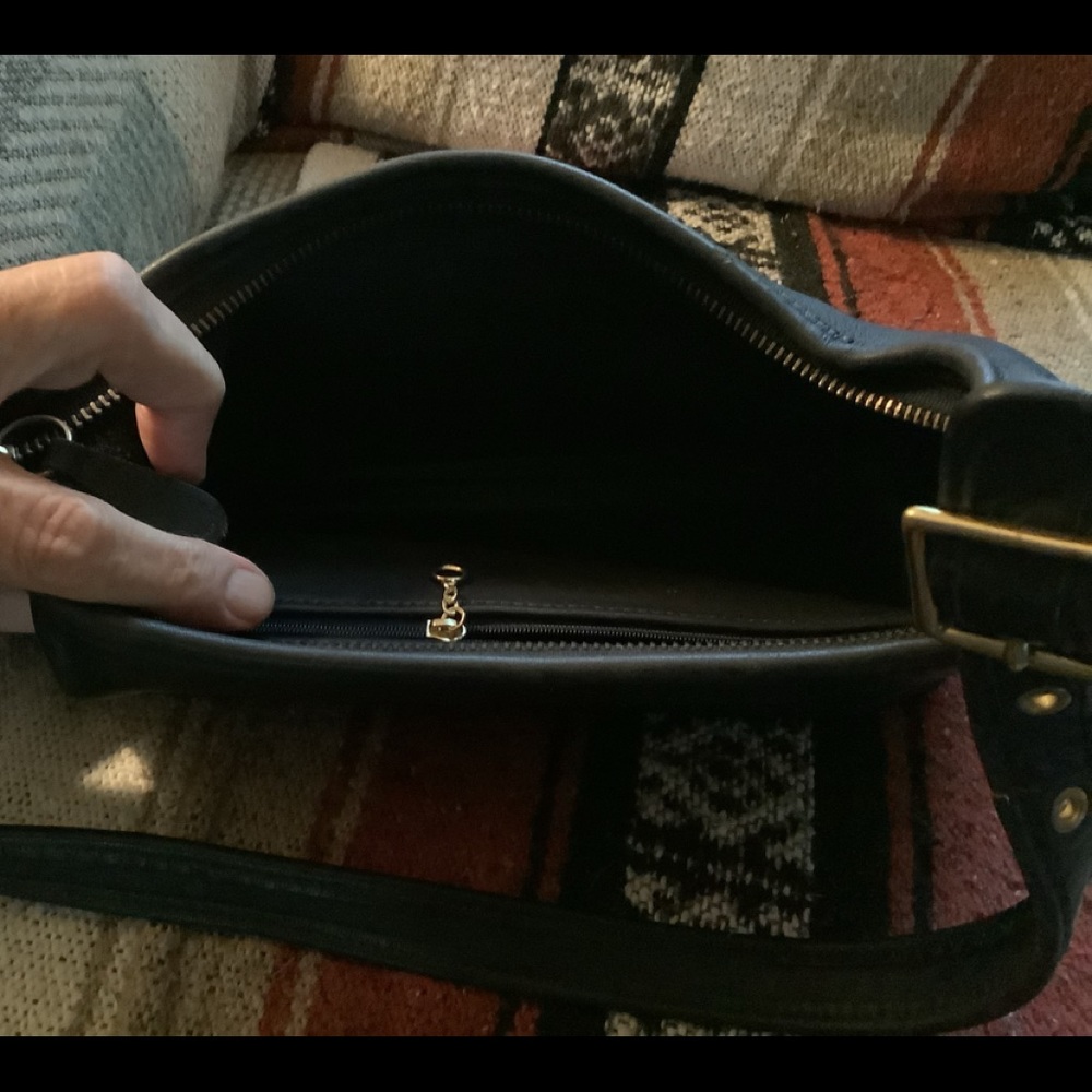 Gently used blue coach handbag